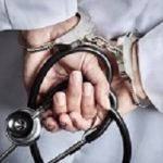 Female Doctor or Nurse In Handcuffs and Lab Coat Holding Stethoscope.