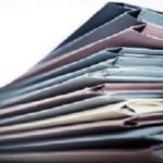 Pile of business document files