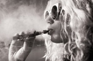 Black and white picture of woman smoking e-cigarette