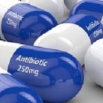 3d rendering of antibiotic pills over white background