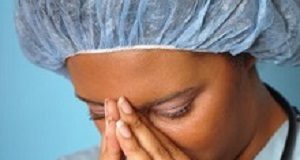 It's nurses and midwives who bear the brunt of stress and burnout Crying nurse with her hands on her face