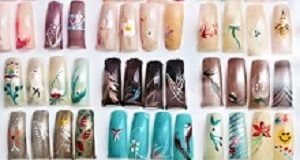 DPO readings not affected by nail polish or acrylic nails Artificial acrylic nails painted in various designs on display in nail salon