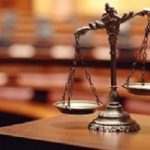 Symbol of law and justice in the empty courtroom, law and justice concept.