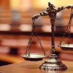 Symbol of law and justice in the empty courtroom, law and justice concept.