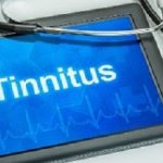 Tablet with the diagnosis tinnitus on the display