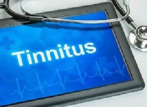 Tablet with the diagnosis tinnitus on the display