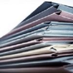 Pile of business document files