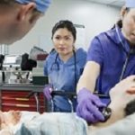 Patient and doctors in the emergency room