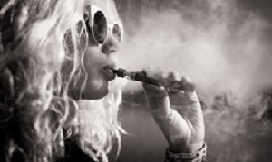 Black and white picture of woman smoking e-cigarette