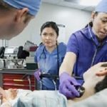 Patient and doctors in the emergency room