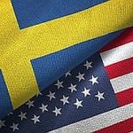 United States and Sweden two flags together textile cloth fabric texture