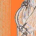 Beautifil Silhouette of a pregnant woman with highlight on belly