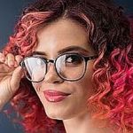 Young bright woman with eyeglasses