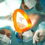 Skillful doctors are preparing person for operation