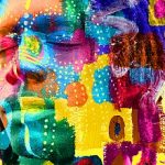 Paintography. Double exposure of a dark skinned male model with closed eyes and dreadlocks combined with colorful hand drawn paintings