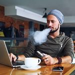 9-MB-Harm Reduction-15-04-2021-Vape-Vaping-e-cigarette-Work-laptop-iStock-904351660