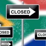 1-MB-Focus-26-08-2021-COVID-South Africa-Lockdown-Flag-Coronavirus-iStock-1215744937