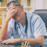 10-MB-Talking Points-07-10-2021-Doctor-tired-stress-burnout-iStock-868924670