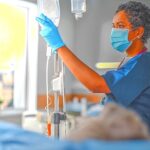 3-MB-Focus-27-01-2022-4-Nurse-Nursing-Covid-Hospital-Patient-iStock-1321691597