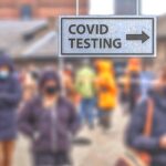 10-MB-Policy and Law-03-02-2022-1-COVID-Testing-sign-people-Europe-Denmark-Coronavirus-iStock-1292412808