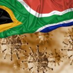 8-MB-Policy and Law-10-02-2022-South Africa-Coronavirus-Flag-COVID-iStock-1213946040